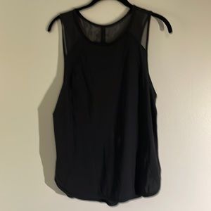 Lululemon black tank. Keyhole back with soft netting details.